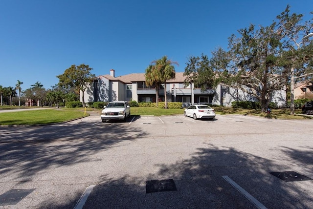 view of front of home with a front lawn