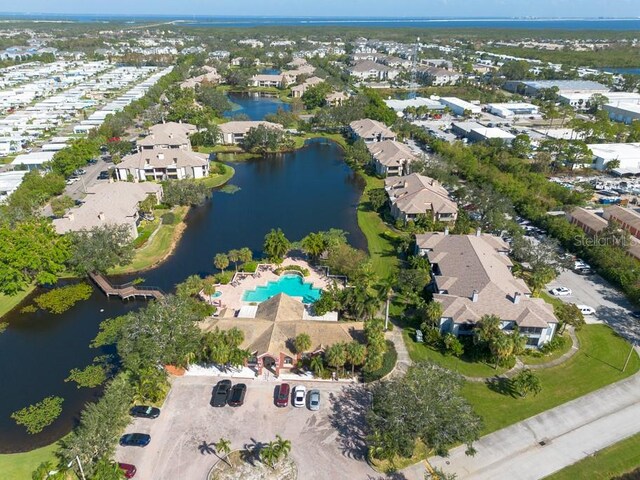 bird's eye view with a water view