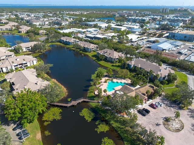 bird's eye view with a water view