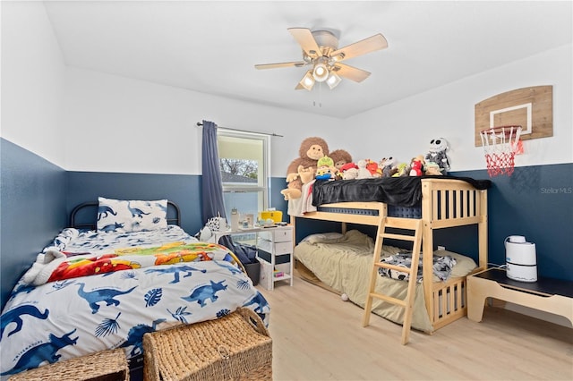 bedroom featuring wood-type flooring and ceiling fan