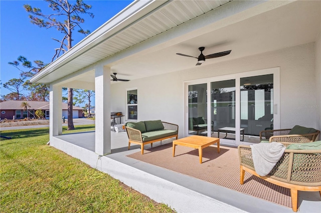 view of patio / terrace with ceiling fan and outdoor lounge area