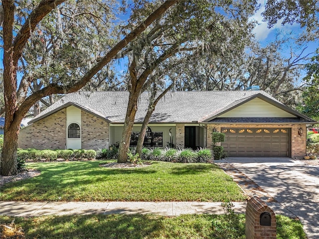 single story home with a front lawn and a garage