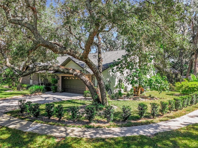 view of front of home with a garage