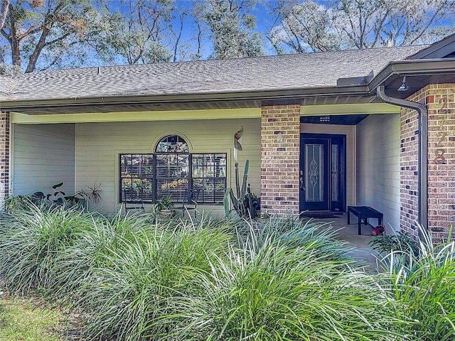 doorway to property featuring a porch