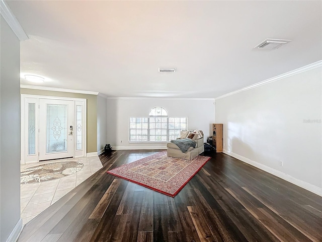 living room featuring crown molding and dark wood-type flooring