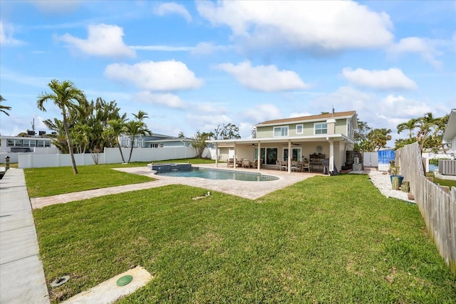 7886 9th Ave S, Saint Petersburg, FL 33707 - back of property with ceiling fan and a patio