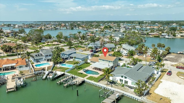 7886 9th Ave S, Saint Petersburg, FL 33707 - aerial view of residential area featuring a nearby body of water and a pool