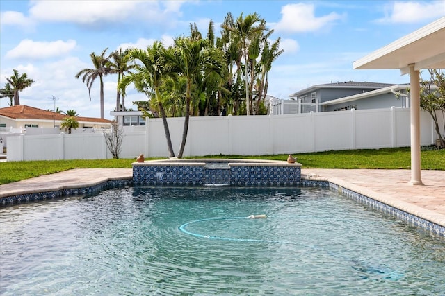 7886 9th Ave S, Saint Petersburg, FL 33707 - view of swimming pool with a fenced backyard, an outdoor hot tub, and a patio
