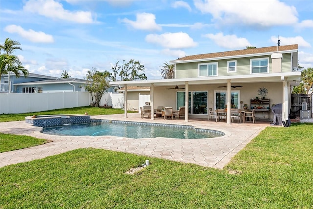7886 9th Ave S, Saint Petersburg, FL 33707 - back of house with a ceiling fan, stucco siding, an outdoor living space, and a patio area