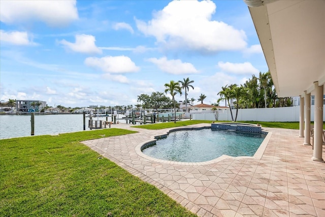 7886 9th Ave S, Saint Petersburg, FL 33707 - view of pool featuring boat lift, a boat dock, a water view, a pool with connected hot tub, and a patio