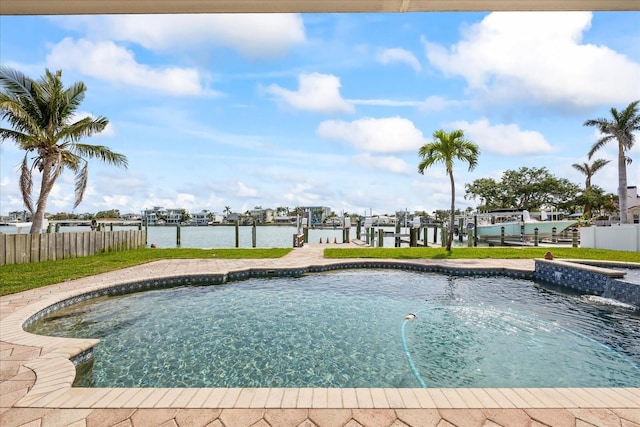 7886 9th Ave S, Saint Petersburg, FL 33707 - view of swimming pool featuring boat lift, a boat dock, a water view, and a pool with connected hot tub