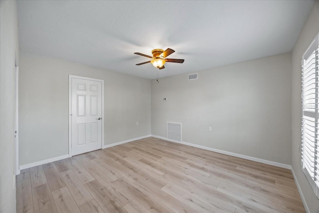7886 9th Ave S, Saint Petersburg, FL 33707 - unfurnished room featuring ceiling fan, light wood finished floors, and baseboards