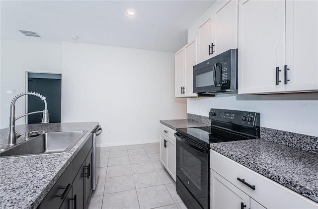 kitchen with white cabinetry, black appliances, sink, and light stone counters