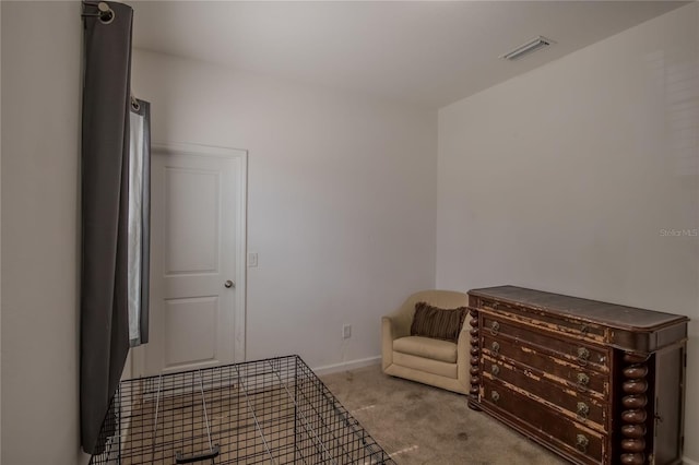 bedroom featuring light carpet