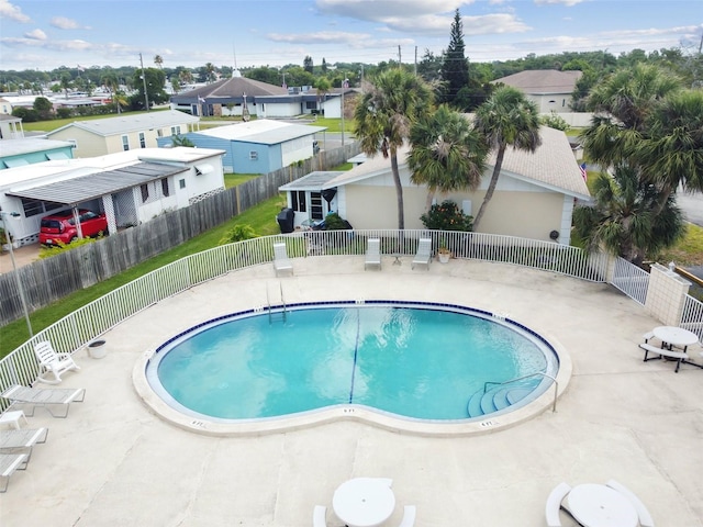 view of swimming pool with a patio