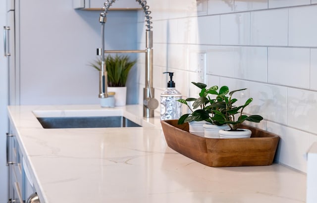 room details featuring light stone counters