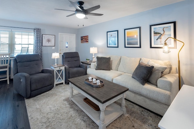 living room with ceiling fan and hardwood / wood-style floors