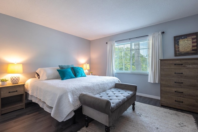 bedroom featuring dark hardwood / wood-style floors