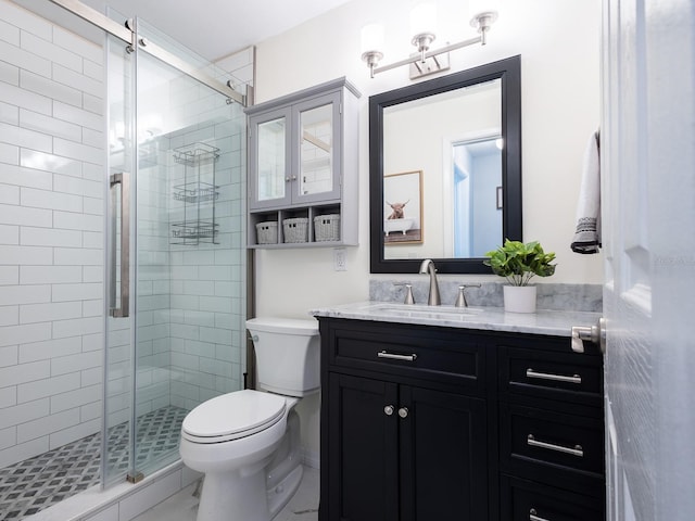 650 Pinellas Point Dr S Unit 211, Saint Petersburg, FL 33705 - bathroom featuring vanity, toilet, and a shower stall