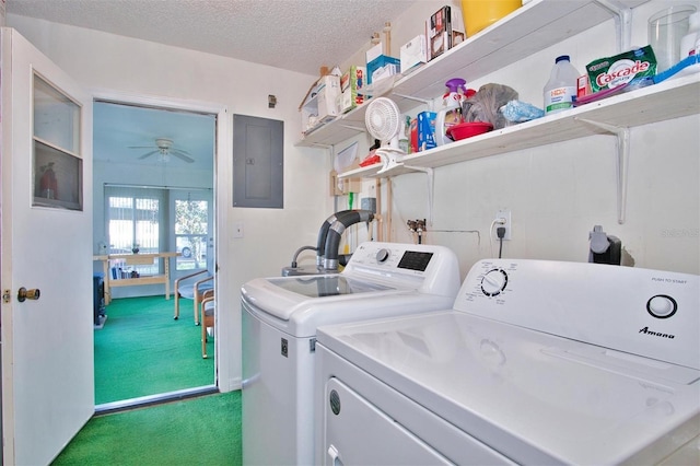 clothes washing area featuring carpet flooring, a textured ceiling, washer and clothes dryer, ceiling fan, and electric panel