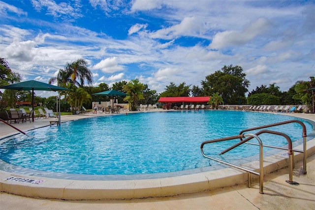 view of swimming pool featuring a patio