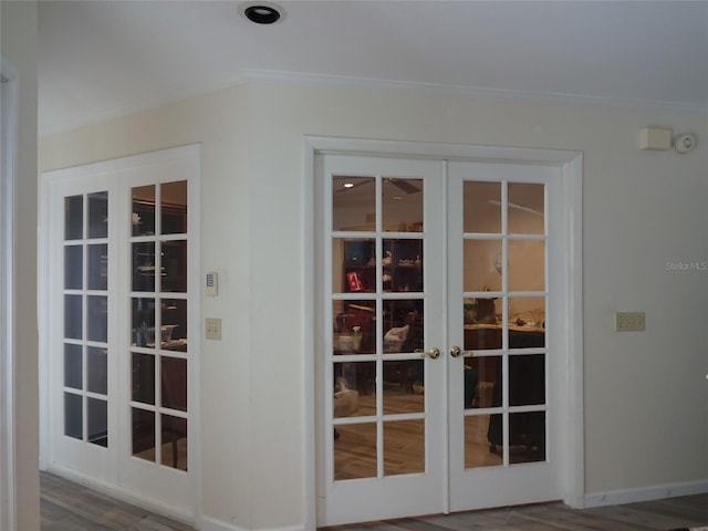 doorway to outside with french doors and hardwood / wood-style floors