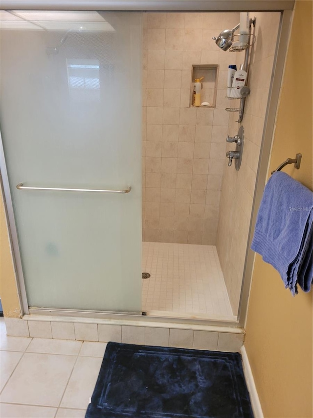 13936 Clubhouse Cir Unit 13936, Tampa, FL 33618 - full bath featuring a shower stall and tile patterned floors
