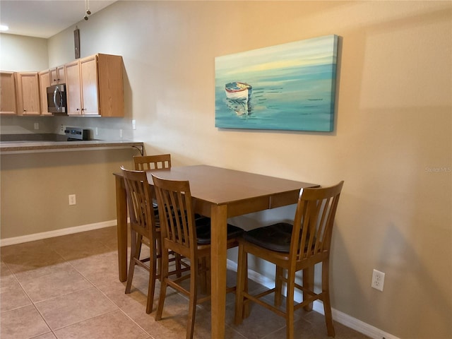 dining room featuring light tile patterned floors