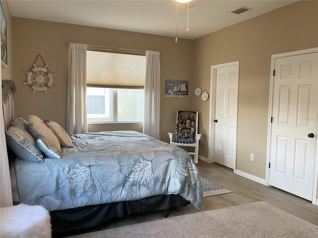 bedroom featuring hardwood / wood-style flooring