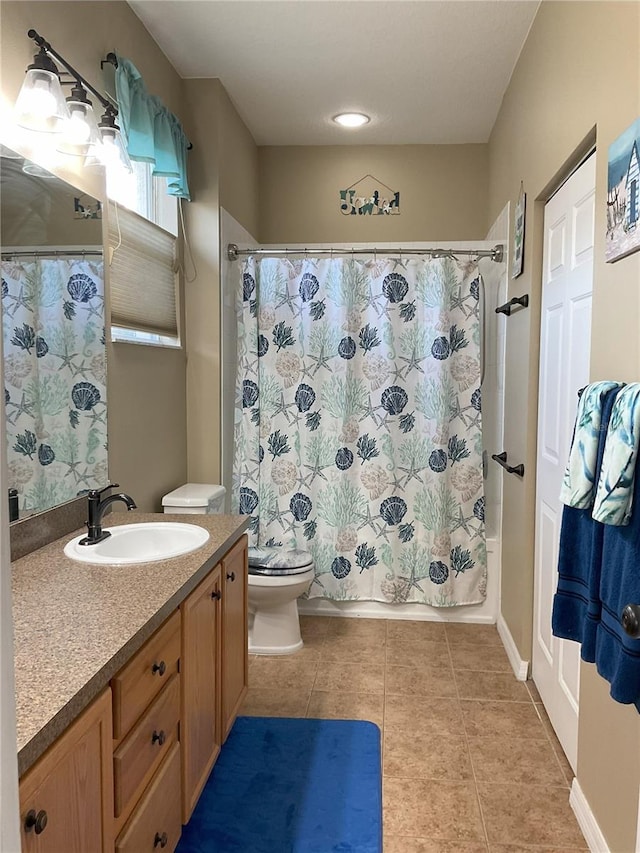 full bathroom with vanity, toilet, shower / bathtub combination with curtain, and tile patterned flooring