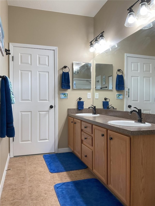 bathroom featuring vanity and tile patterned floors