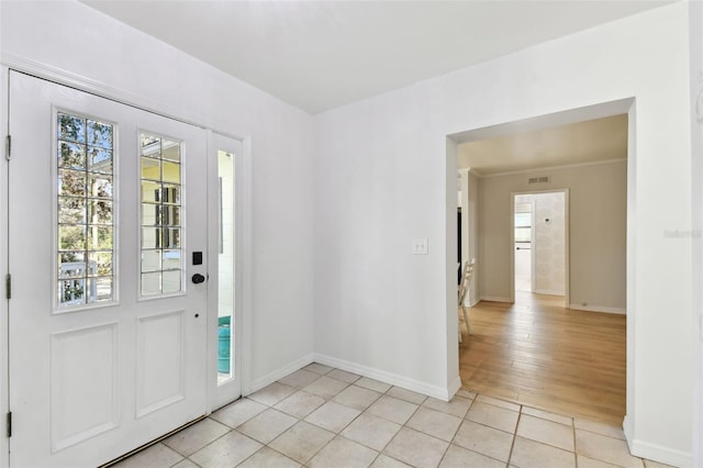 foyer with light hardwood / wood-style flooring