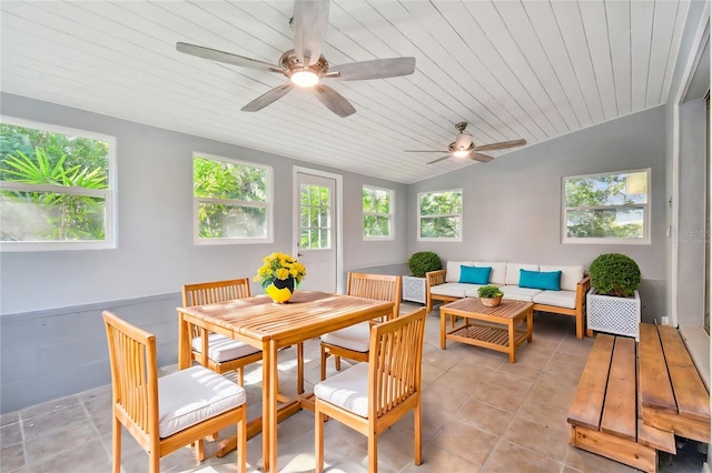 sunroom / solarium featuring ceiling fan, wooden ceiling, and vaulted ceiling