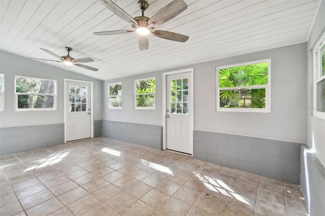 unfurnished sunroom with lofted ceiling, ceiling fan, and wooden ceiling