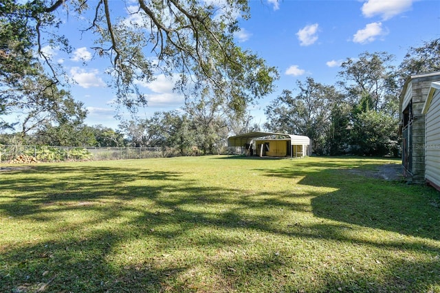 view of yard with a carport