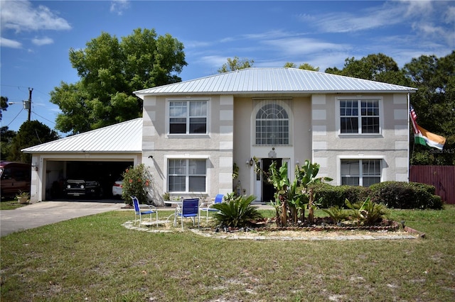 view of front facade with a front lawn and a garage