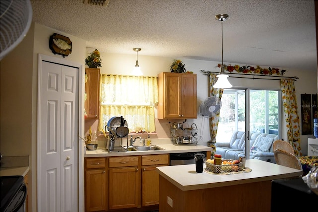 kitchen featuring black electric range oven, hanging light fixtures, a kitchen island, stainless steel dishwasher, and sink