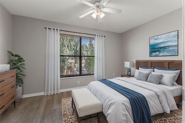 bedroom featuring hardwood / wood-style flooring and ceiling fan