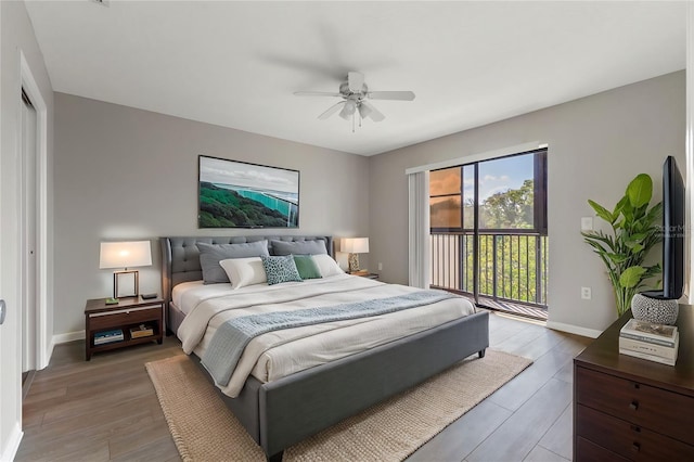 bedroom featuring hardwood / wood-style flooring, access to outside, ceiling fan, and a closet