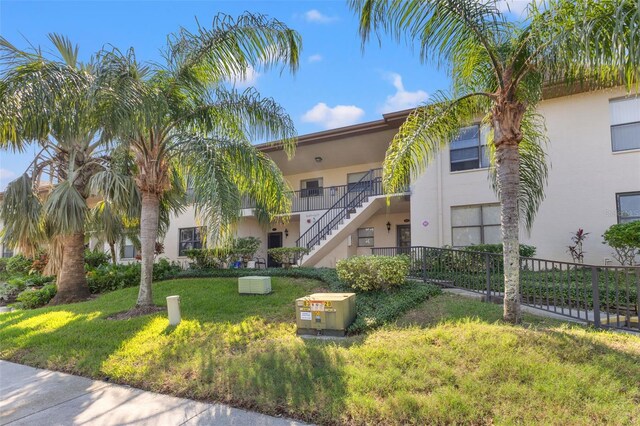 1662 Seascape Cir Unit 205, Tarpon Springs, FL 34689 - view of building exterior with stairway