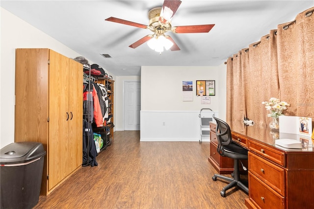 office space featuring light hardwood / wood-style floors and ceiling fan