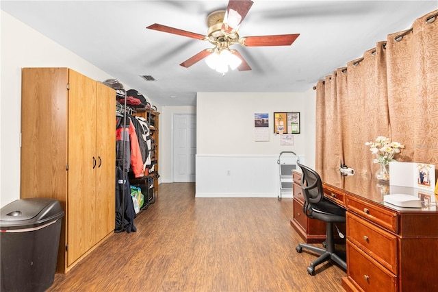 5621 Moog Rd, New Port Richey, FL 34652 - office area featuring wood finished floors and a ceiling fan
