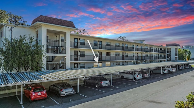 view of outdoor building at dusk