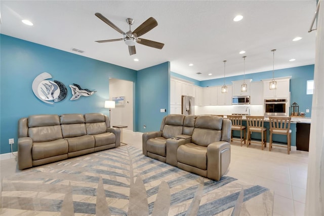 living room featuring ceiling fan