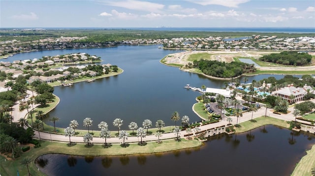 birds eye view of property featuring a residential view and a water view