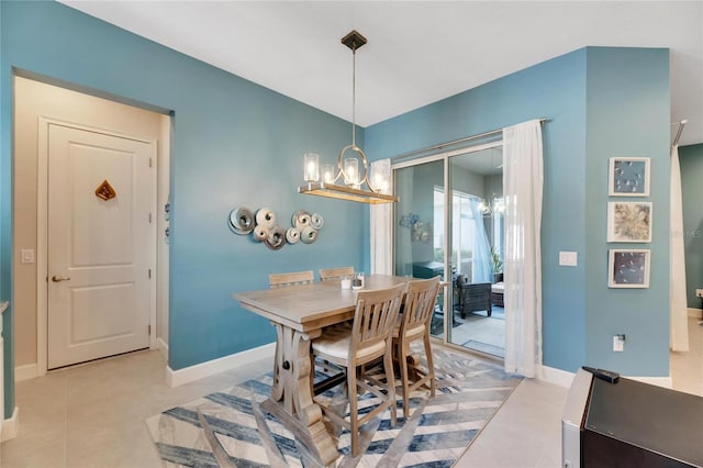 dining space with a notable chandelier