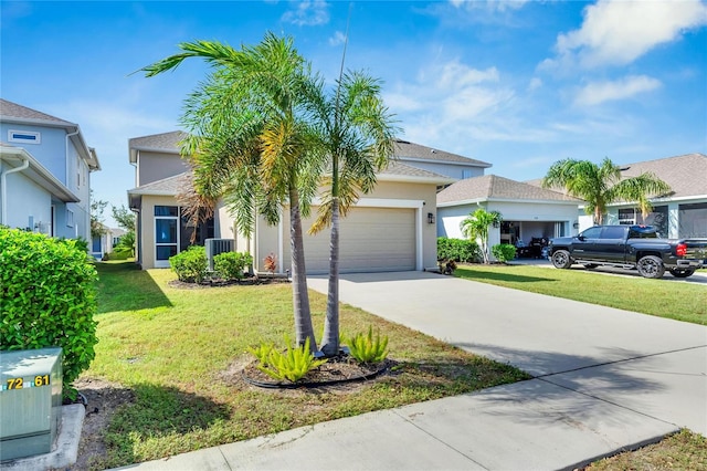 view of front facade with a front yard, central AC unit, and a garage