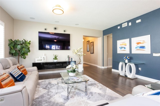 living room with wood-type flooring