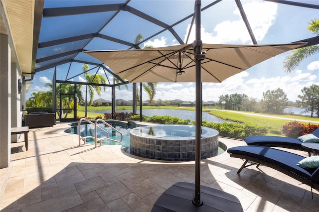 view of patio with an in ground hot tub, a lanai, and a water view