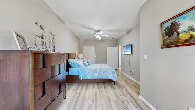 2717 Via Cipriani Unit 622B, Clearwater, FL 33764 - bedroom featuring light wood-style flooring, baseboards, and ceiling fan